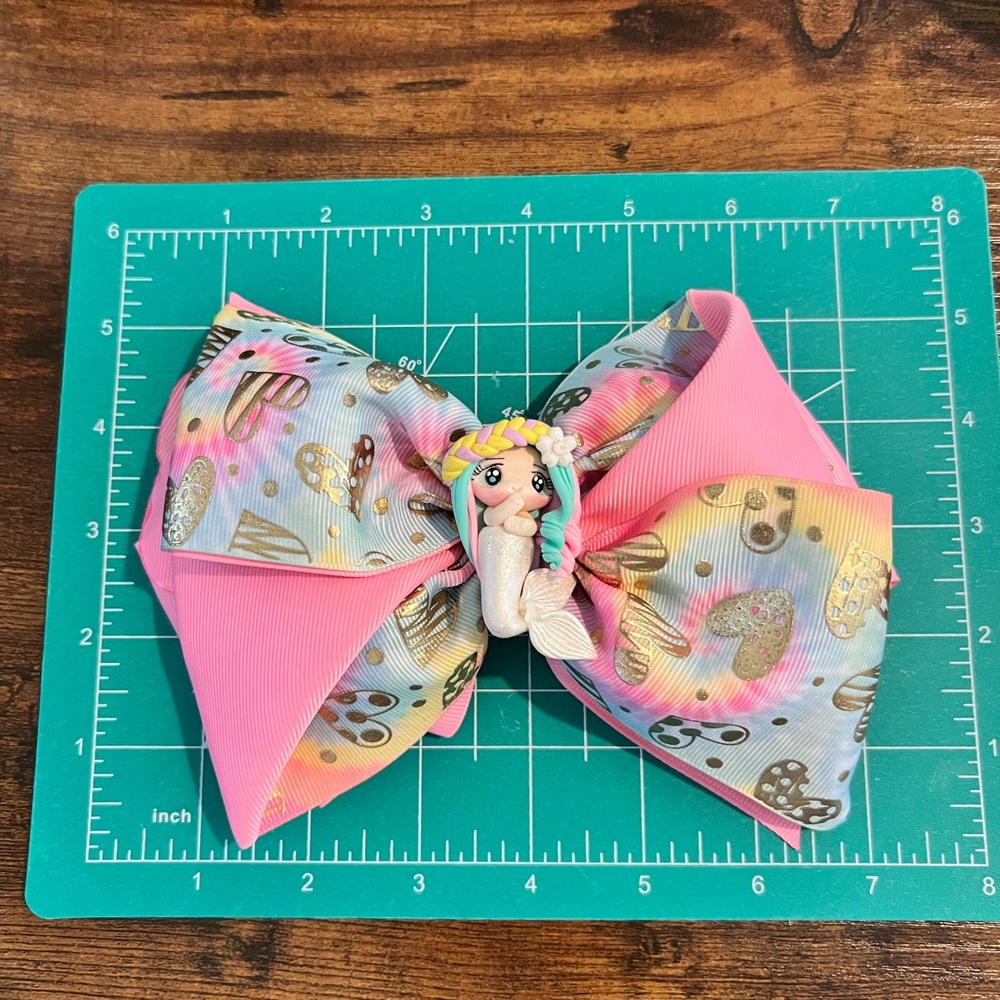 Big hair bow for girl, pink with mermaid, gently used